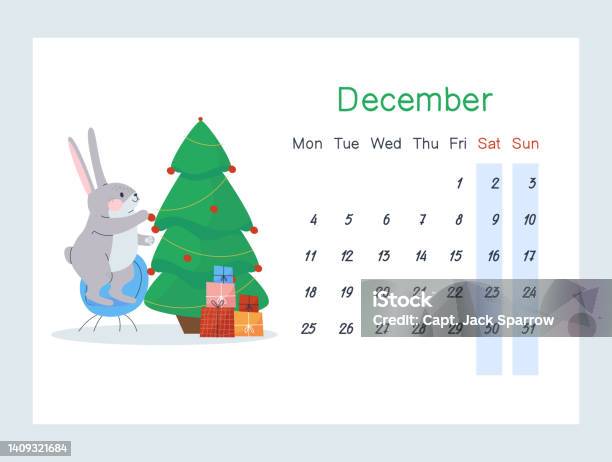 Le Lapin Se Tient Sur Une Chaise Et Accroche Une Boule Rouge Au Sapin Le Lapin Se Tient Sur Une Chaise Et Accroche Une Boule Rouge Au Sapin