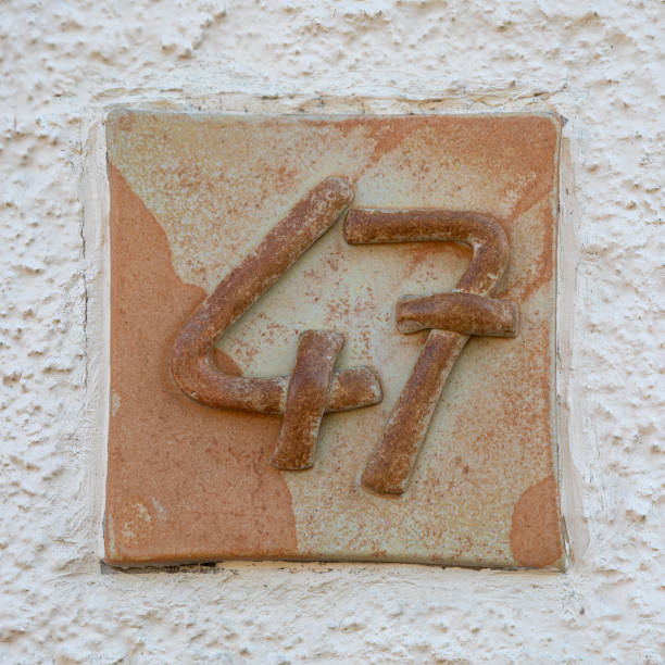 istock 47 - Handmade house number forty seven 1409325766