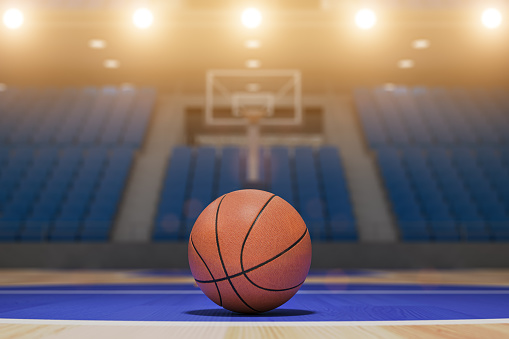 Basketball ball on the fllor of empty basketball arena. 3d illustration