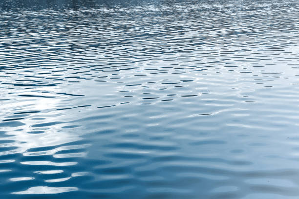 istock Texture of blue sea water 1409331199