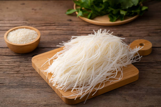 istock Small rice noodle on wood board 1409331257