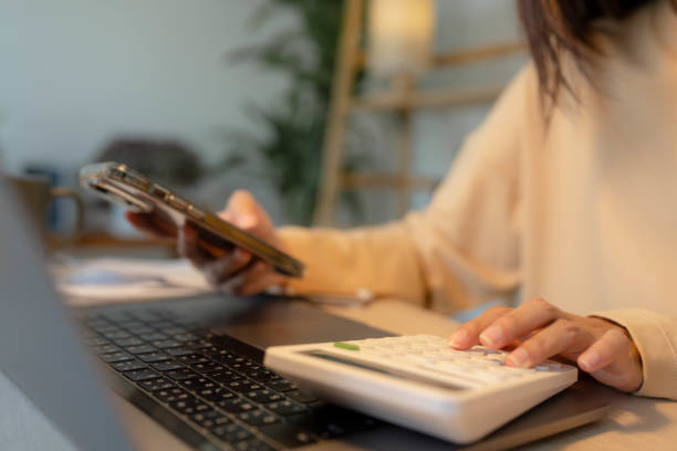 istock Accountancy woman working at home. 1409338573