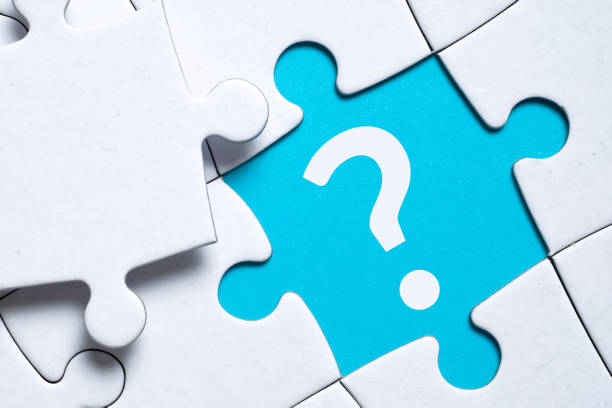 istock Question mark concept or FAQ. Sign in a puzzle 1409338974