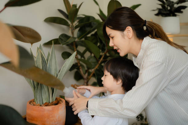 istock Mother teaching children to be responsible for the environment. 1409339537