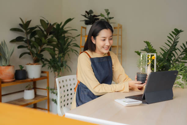 istock Young entrepreneur at her new business. 1409343346