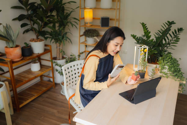 istock Young entrepreneur at her new business. 1409343347