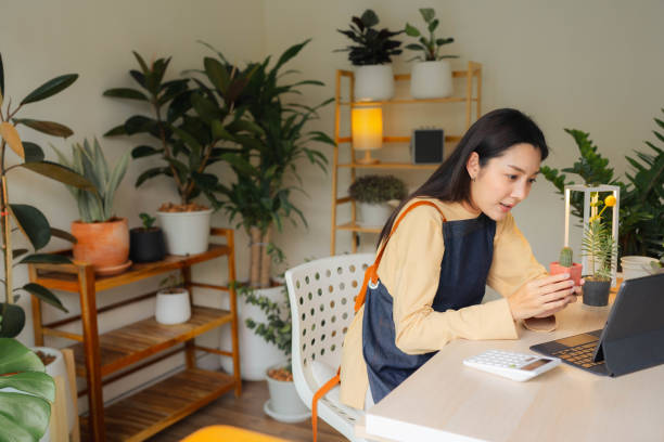 istock Young entrepreneur at her new business. 1409343352