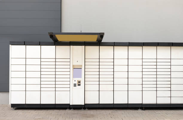 pickup station - logistical point, automat terminal for depositing items (shipments), is a modern parcel locker with many postal boxes. self service, contactless pack delivery. horizontal plane. - logistical imagens e fotografias de stock