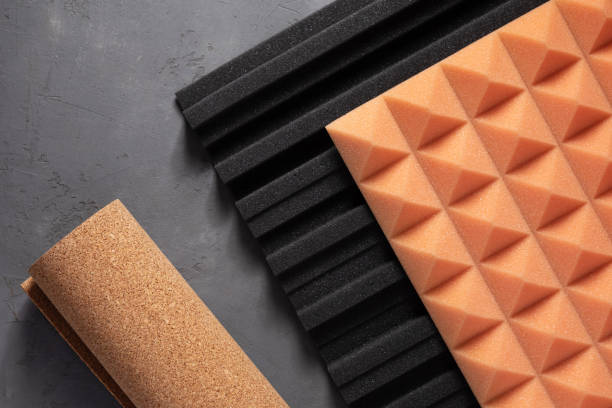 istock Acoustic foam and cork on concrete wall background. Sound isolation material for record studio 1409349577