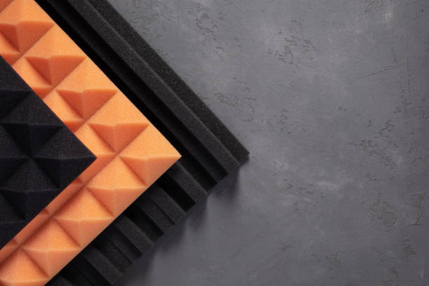 istock Acoustic foam material on concrete wall background texture. Foam rubber panel for record studio 1409349580