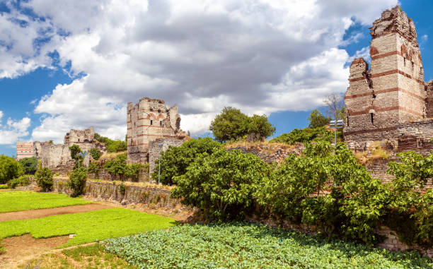 Walls of Constantinople view, Istanbul, Turkey Walls of Constantinople view, Istanbul, Turkey. Old stone walls are landmark of Istanbul. Constantinople was capital of Byzantine Empire. Panorama of Ancient Roman monument in historic Fatih area. ancient rome stock pictures, royalty-free photos & images