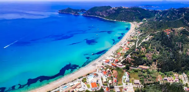 Photo of Best scenic beaches of Corfu island - long beach Agios Georgios Pagon in northern part.  Aerial view. Greece , ionian islands