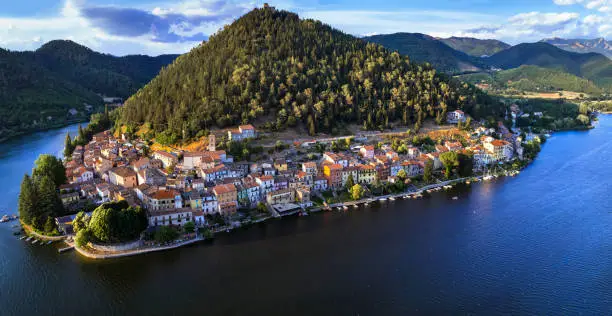 Photo of Most beautiful scenic Italian lakes - small picturesque lake Piediluco with colorful houses in Umbria, Terni province. Aerial panoramic view