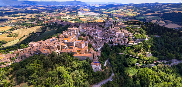 Traditional Italy travel - scenic medeival town Todi in Umbria with beautiful countryside. Panoramic aerial  view
