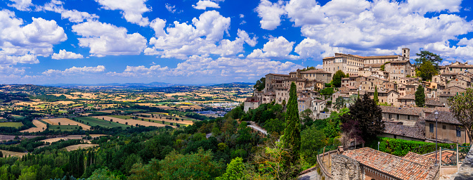 Traditional Italy travel - scenic medeival town Todi in Umbria. Panoramic view