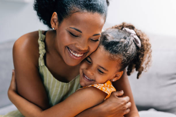 istock Mother And Daughter Hugging 1409356149
