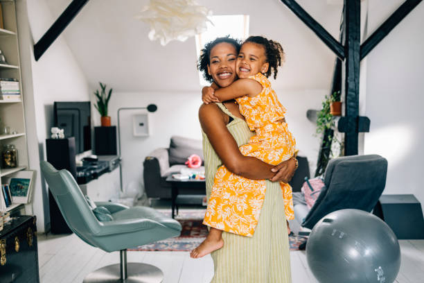 istock Mother And Daughter Hugging 1409356168