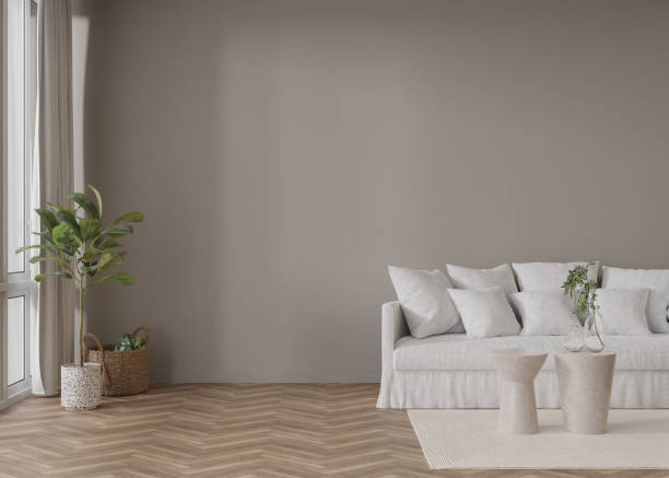 istock Empty grey wall in modern living room. Mock up interior in contemporary style. Free, copy space for your picture, text, or another design. Sofa, carpet, table. 3D rendering. 1409356509