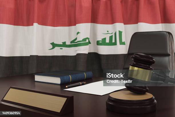 Law And Justice Concept Gavel On A Wooden Desktop And The Iraq Flag On Background 3d Render Stock Photo - Download Image Now