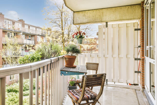 istock Narrow balcony with chair and door 1409362234