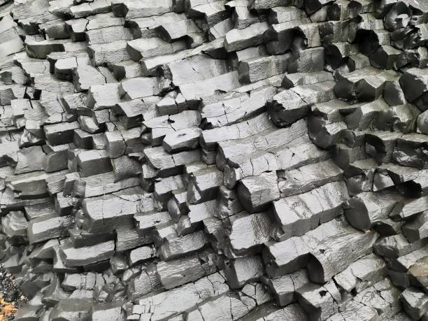 istock Amazing basalt rock structures at Endless Black Beach of Iceland. 1409362349