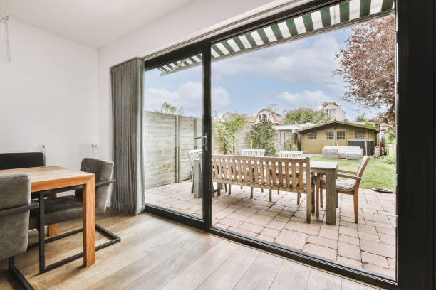 istock Elegant dining room near big backyard door 1409364045