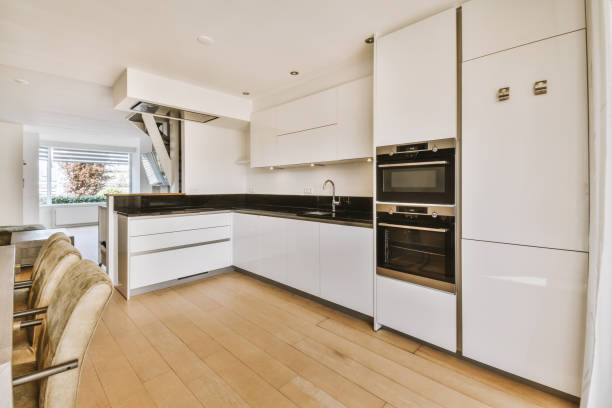 istock Corner kitchen furniture in modern apartment 1409365077