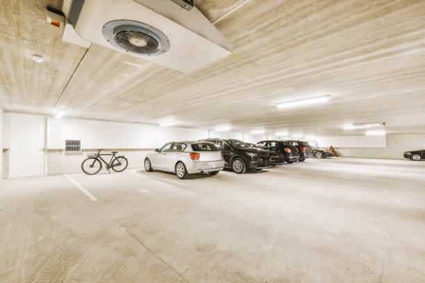 istock Parking with cars and bicycles 1409367631