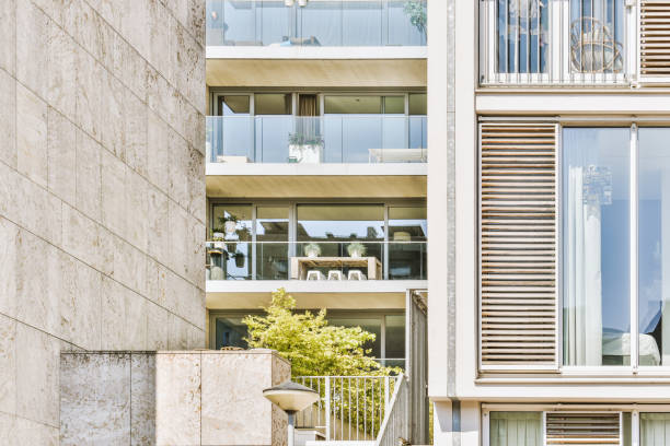istock The facade of a brick building with balconies 1409367638