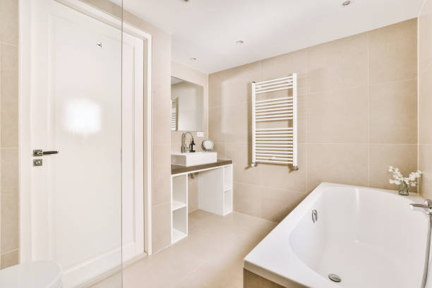 istock Interior of bathroom with white bathtub 1409370286