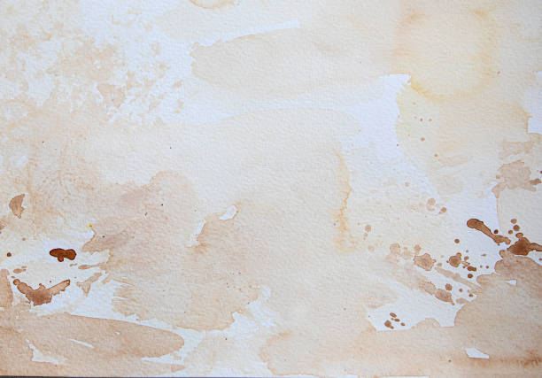 istock Abstract soft sepia watercolor background on a white paper. 1409372062