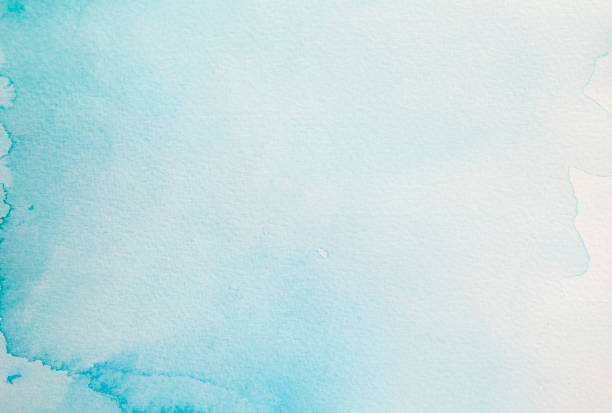 Abstract  soft blue watercolor background on a white paper. stock photo
