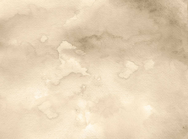 istock Abstract soft sepia watercolor background on a white paper. 1409378267