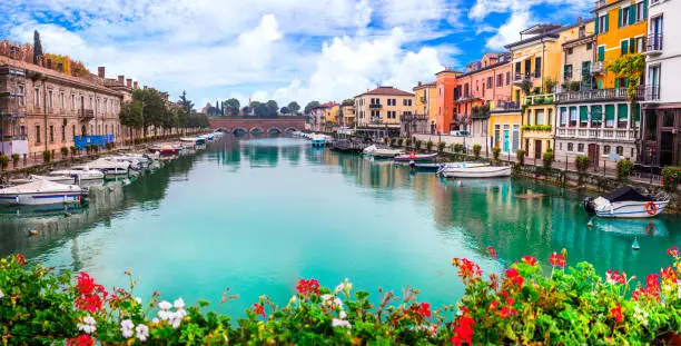 Photo of Peschiera del Garda - charming village with colorful houses in beautiful lake Lago di Garda. Verona province, northern Italy