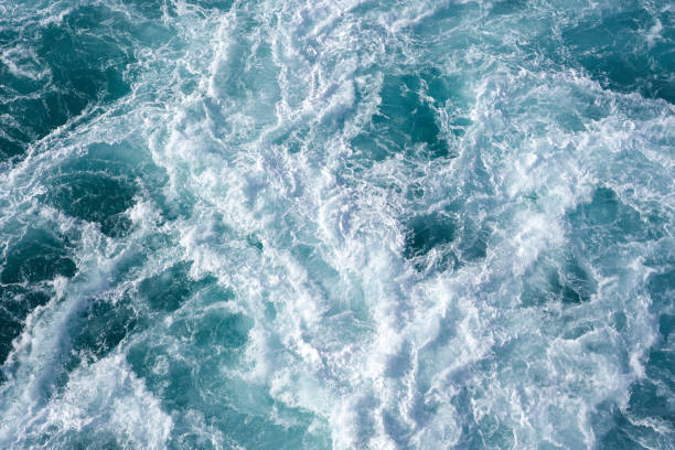 Cruise ship wake while leaving the pier in Hawaii Water abstract background. Cruise ship wake while leaving the pier in Hawaii spume stock pictures, royalty-free photos & images