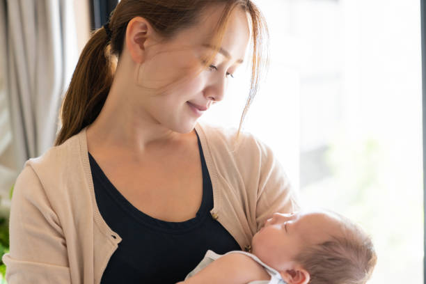 istock asian mother and baby,sleeps 1409385472