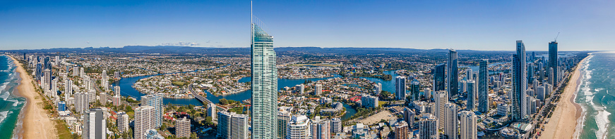 Panoramic aerial drone view of the iconic Gold Coast Beach at Surfers Paradise on the Gold Coast of Queensland, Australia on a sunny day