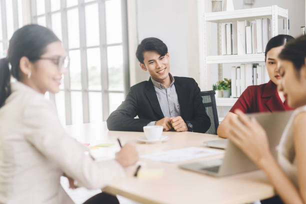 istock Southeast asian Business people group coworker working in office 1409393806