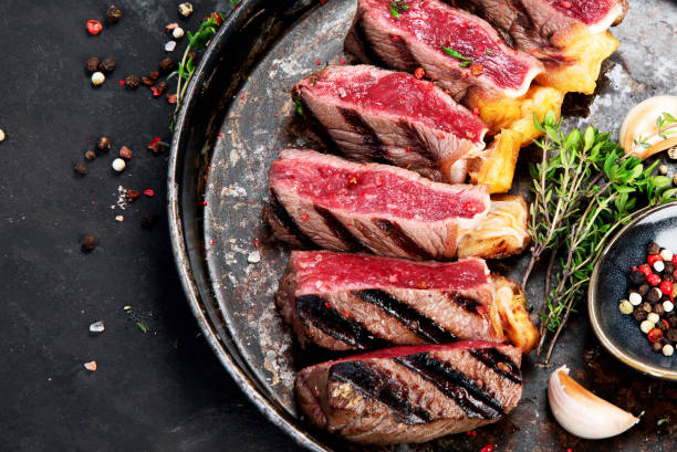 istock Grilled beef steak with pepper and salt. 1409397787