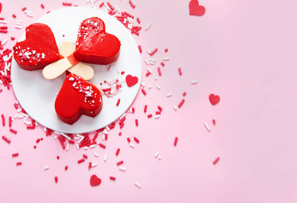 istock Red strawberry ice-cream on pink background. 1409397823