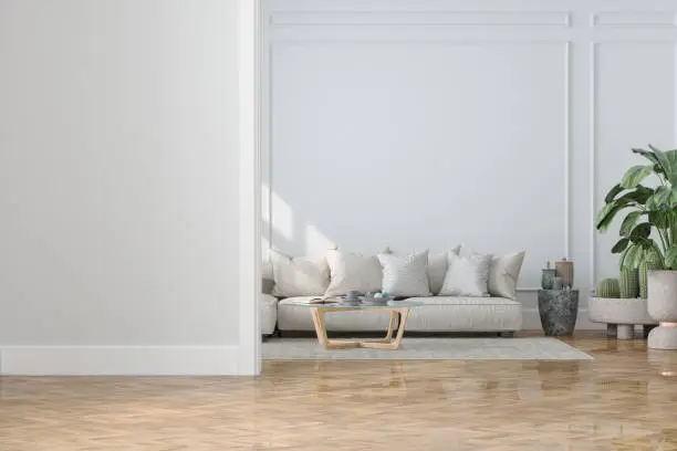 Modern Living Room Interior With Empty Wall, Sofa, House Plants And Coffee Table