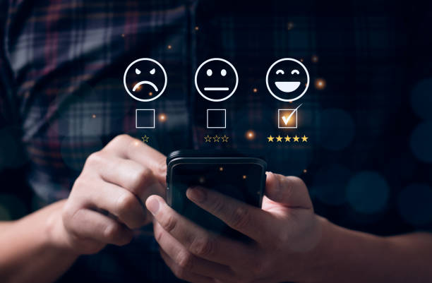 istock Customer satisfaction concept. Hands of business men using a mobile to comment 5 stars. Satisfaction Rating, good and impressive, after sales service. Excellent business rating, reputation 1409403600