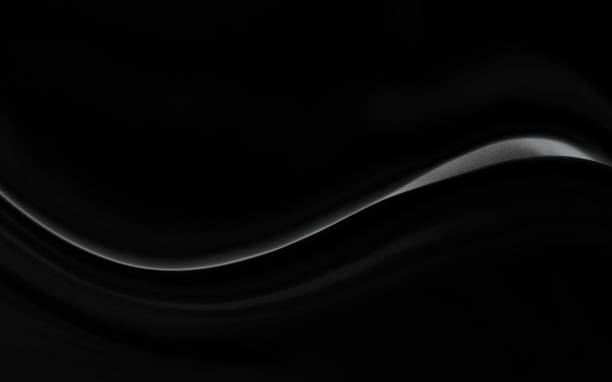 istock Black gray satin dark fabric texture luxurious shiny that is abstract silk cloth background with patterns soft waves blur beautiful. 1409406152