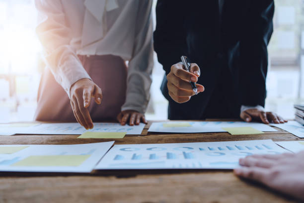 istock Business people meeting working with talk, consult, discuss working with new startup project idea presentation analyze plan marketing and investment in the office. 1409407131