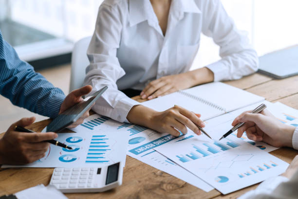 istock Business people meeting working with talk, consult, discuss working with new startup project idea presentation analyze plan marketing and investment in the office. 1409407160