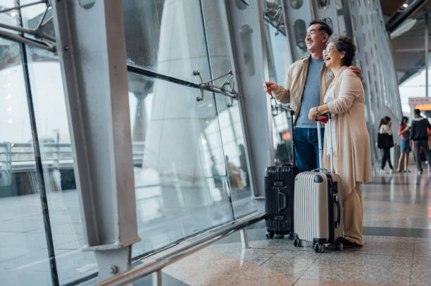 istock Senior Asian couple going for a vacation 1409409142