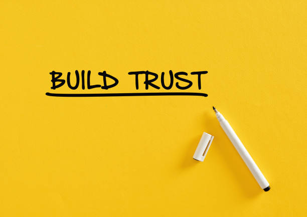 istock Build trust message written on yellow background with felt tip pen. Business confidence, responsibility and partnership 1409417338