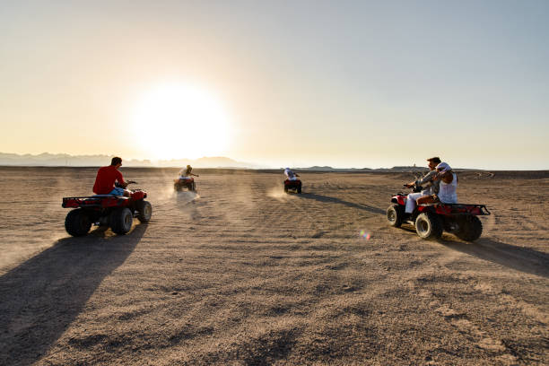 istock Driving quad bikes in the desert! 1409419231