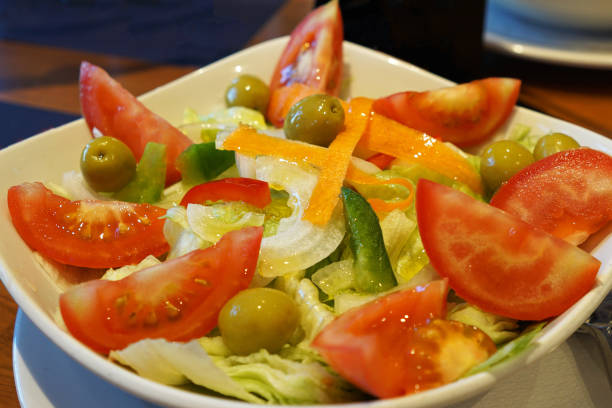 istock Close up bowl of mixed salad 1409420466