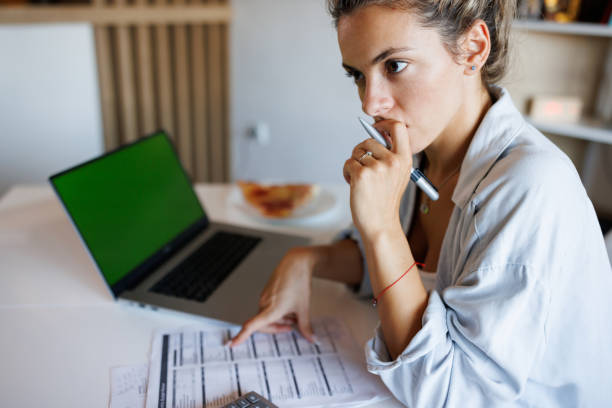 istock Worried about bills she has to pay 1409422549